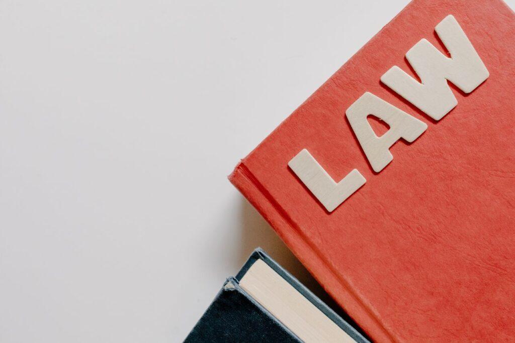 Photo by Tara Winstead: https://www.pexels.com/photo/close-up-of-books-with-a-word-law-on-the-top-8850747/